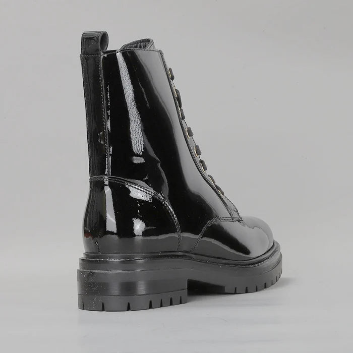 Black patent leather boots by LE SANSA COOLIE, featuring a sleek design and sturdy sole, perfect for stylish everyday wear.
