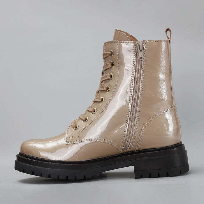 LE SANSA Coolie Blush Patent boots with a sleek, shiny finish and stylish design, perfect for fashionable footwear.