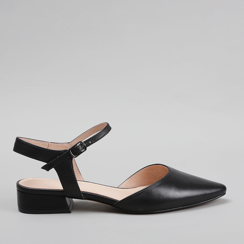 Le Sansa Coralie black patent sandals with side view, stylish open-toe design and ankle strap for a chic summer look.