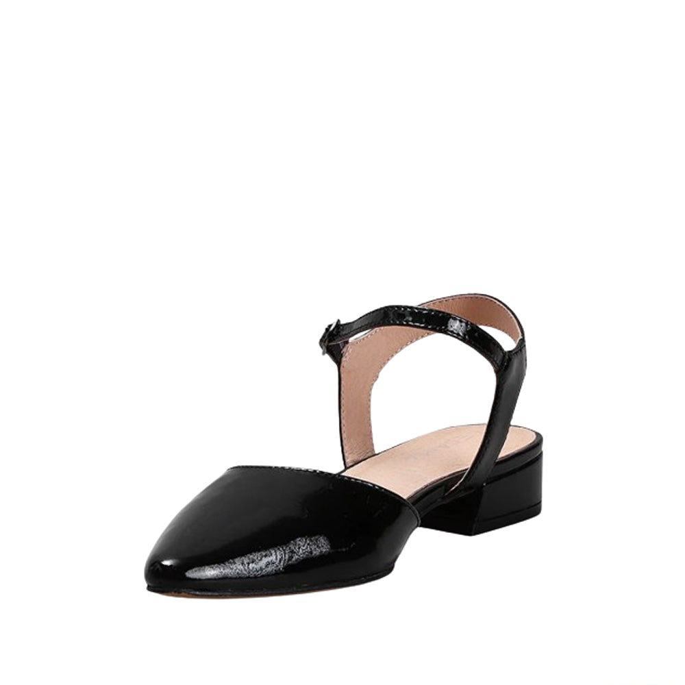Black patent sandals by Le Sansa Coralie with sleek straps and flat sole, perfect for casual or dressy summer wear.