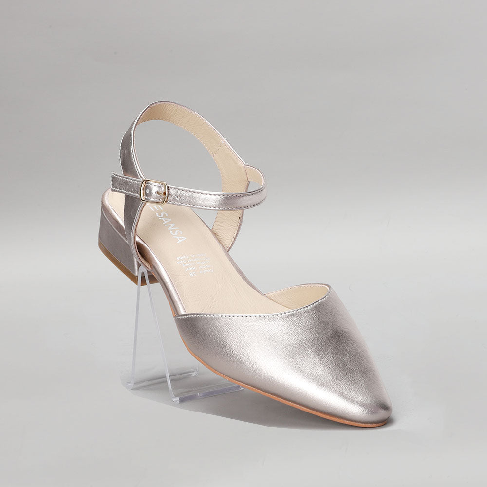 Le Sansa Coralie Champagne sandals with beige straps and open-toe design, perfect for stylish summer wear.