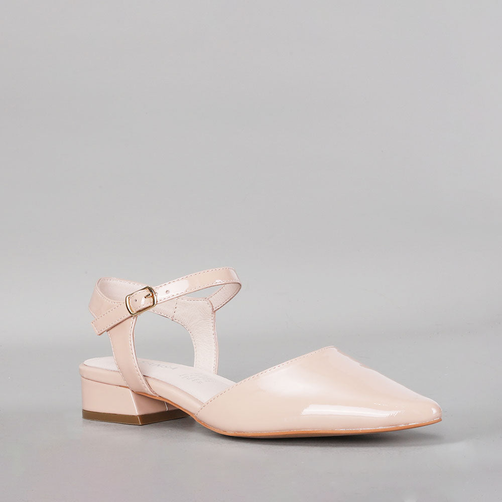 Le Sansa Coralie Nude Patent Sandals showing sleek, nude patent straps on a stylish open-toe design.
