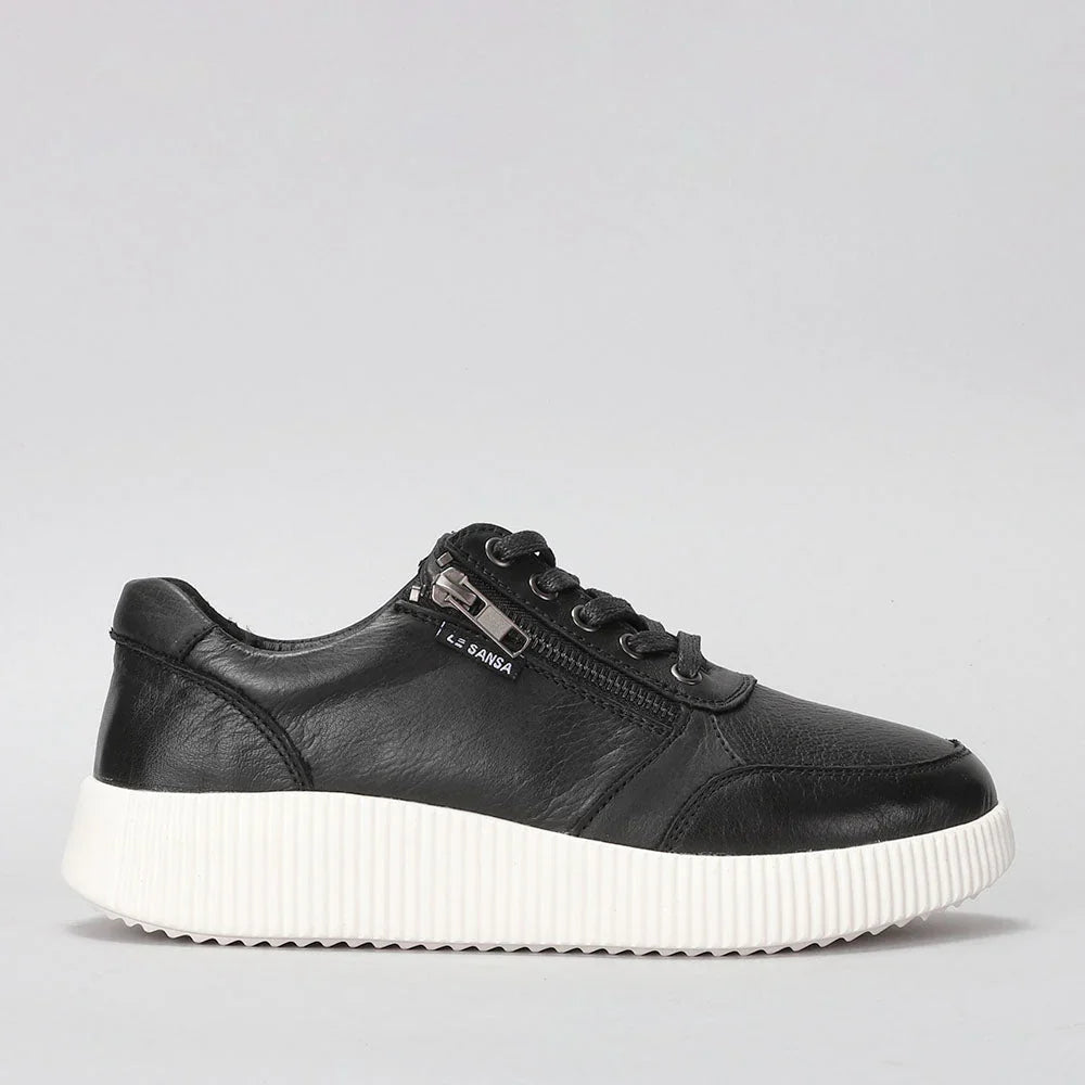 Le Sansa Cosco Black sneakers shown from the side, featuring a sleek black design and casual athletic style.