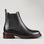 Black LE SANSA COSTA boots by Le Sansa, side view showing sleek design and ankle height.