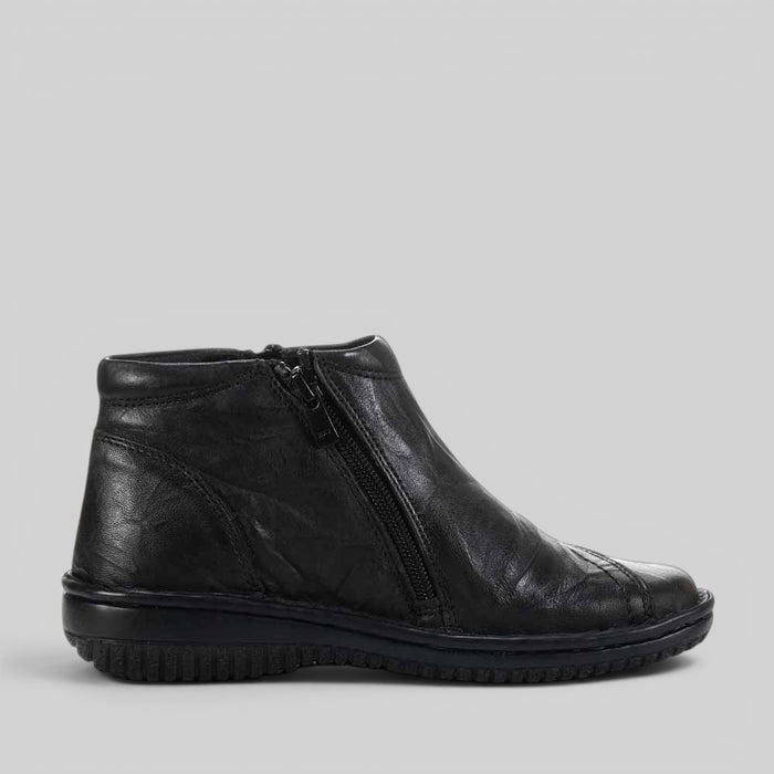 Black crinkle ankle boots by CABELLO featuring a stylish textured finish and modern slip-on design.