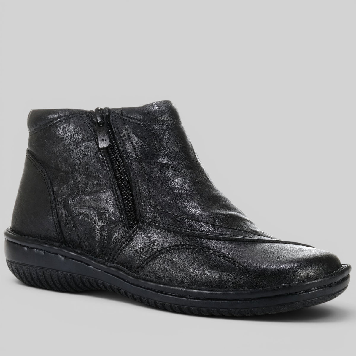 Black crinkle ankle boots by Cabello, stylish women's footwear with a textured finish and sleek design.