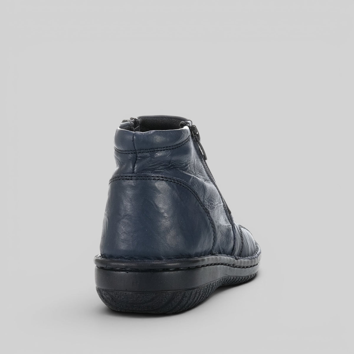 Navy crinkle ankle boots by Cabello featuring a textured finish and stylish design for women.