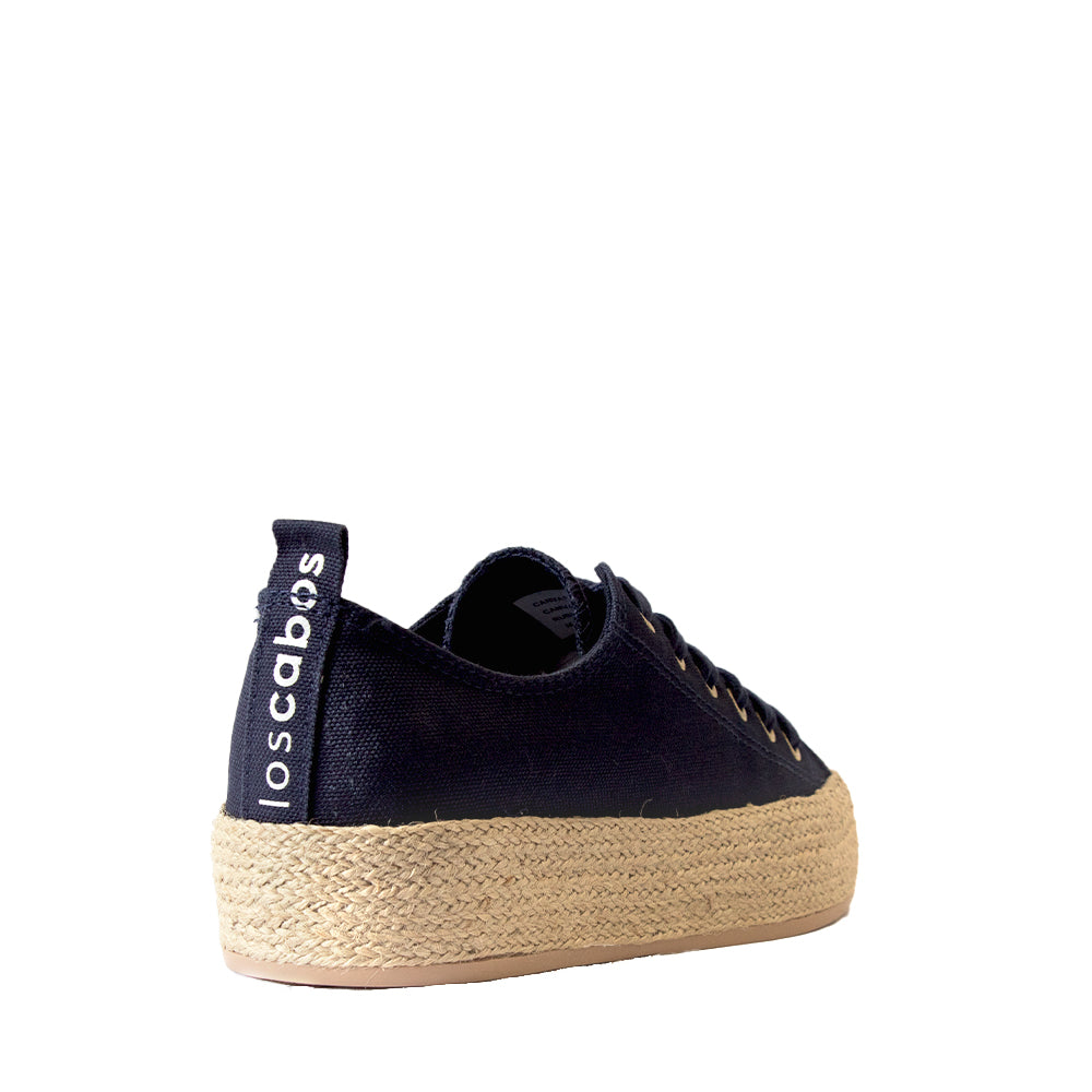 LOS CABOS Candice Navy sneakers with white soles, showcasing the back view of stylish navy canvas shoes.