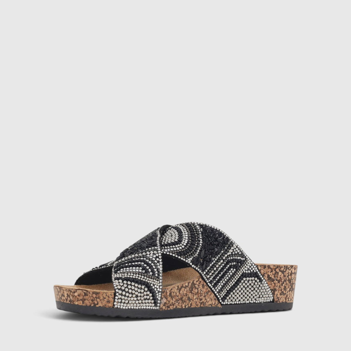Black Los Cabos Capri slippers with a comfortable slip-on design, featuring a soft fabric upper and cushioned sole.