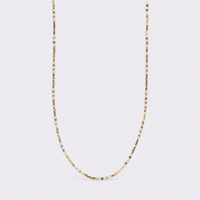 Shiny green miniature necklace from A & C Oslo featuring a delicate pendant on a fine chain.