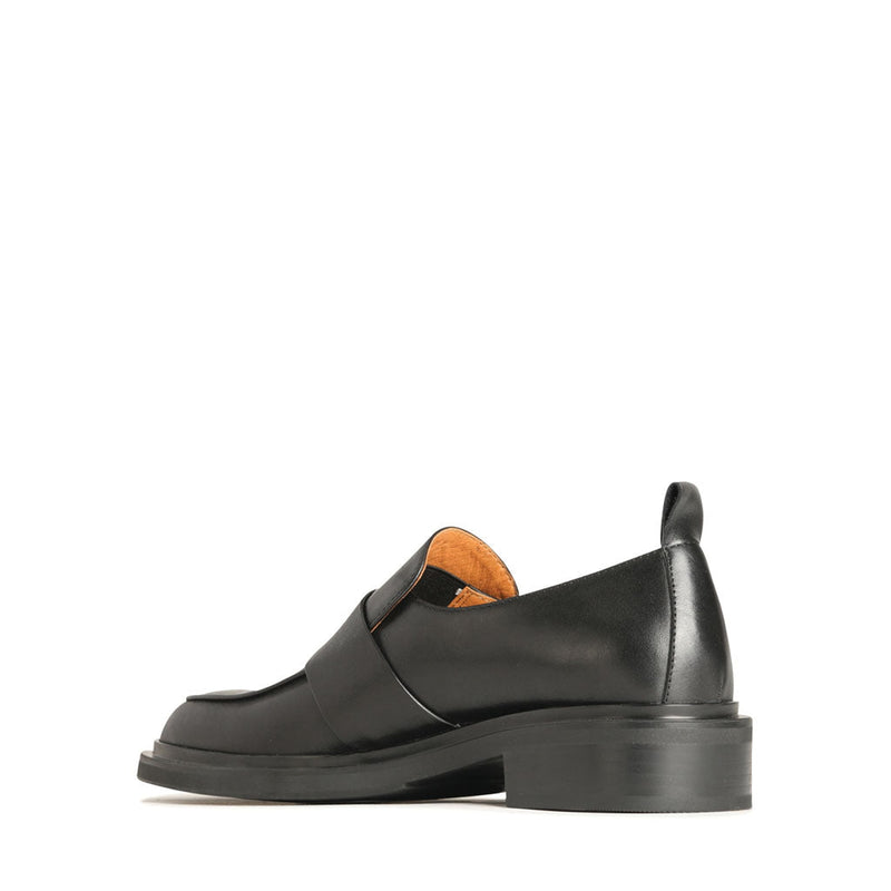 Eos Coia black loafers showing the inside view with sleek leather design and comfortable fit.