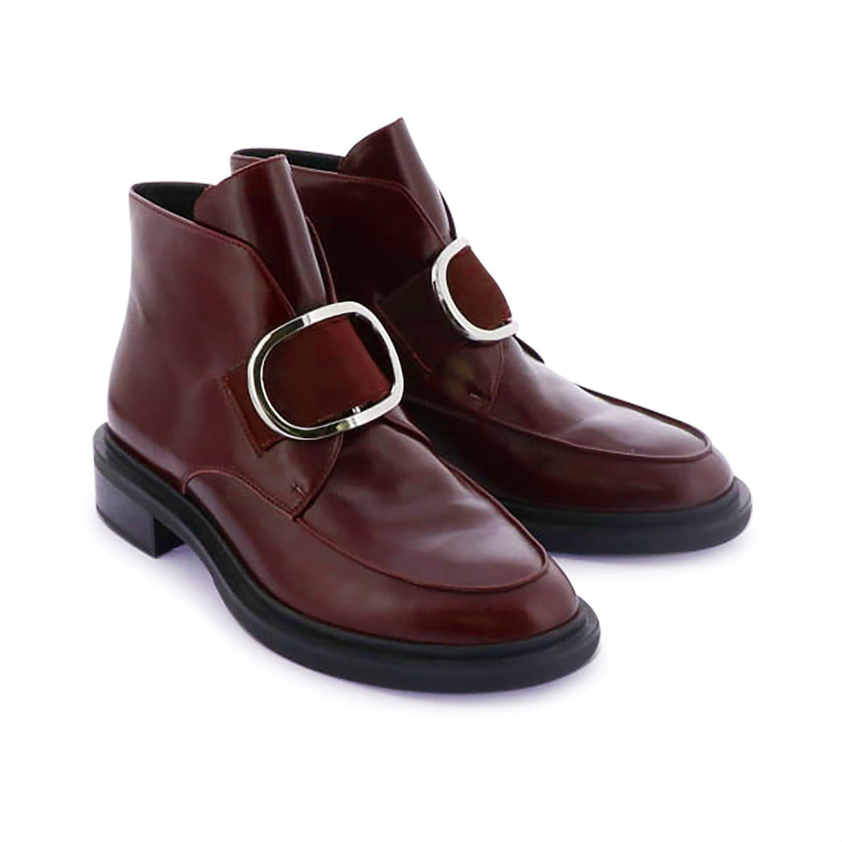 Eos Coine Wine boots with stylish design, showcasing the top view of the Eos brand footwear in a natural setting.