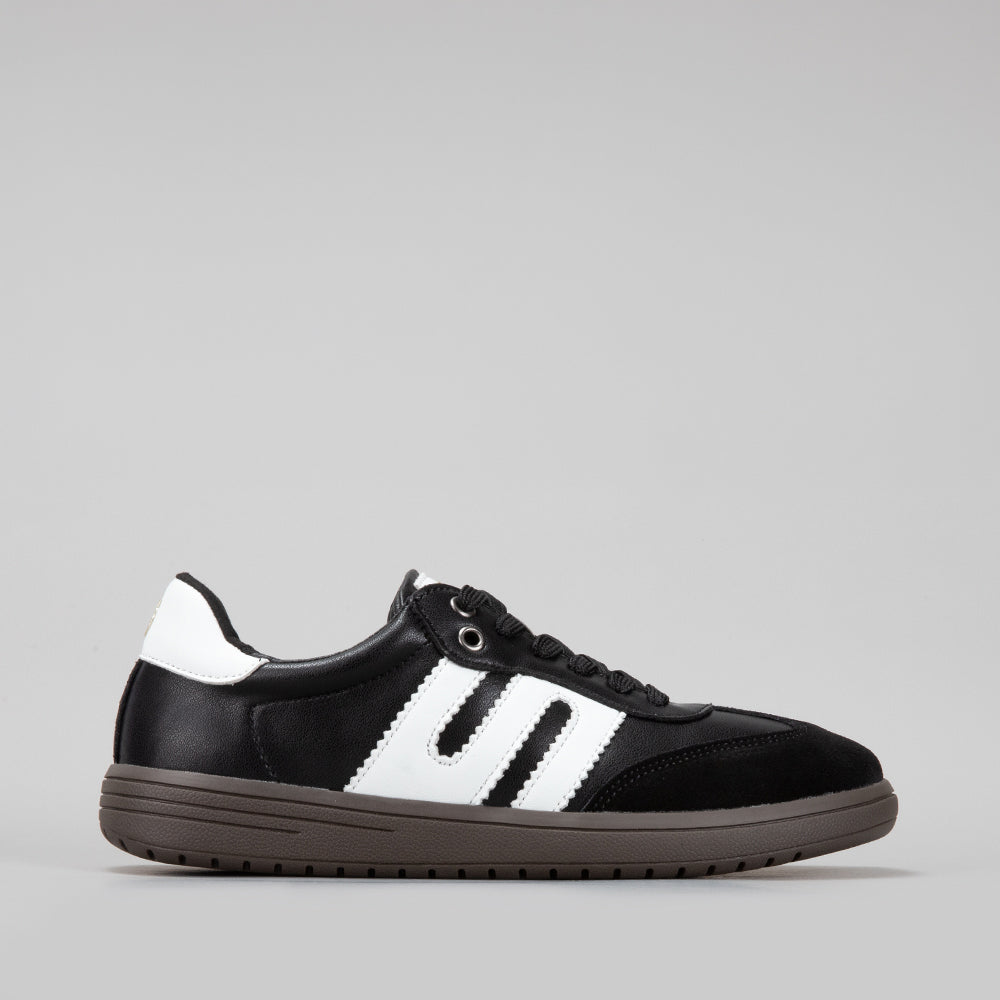 Le Sansa Juno black and white sneakers with stylish design and comfortable fit, showcased from the side view.