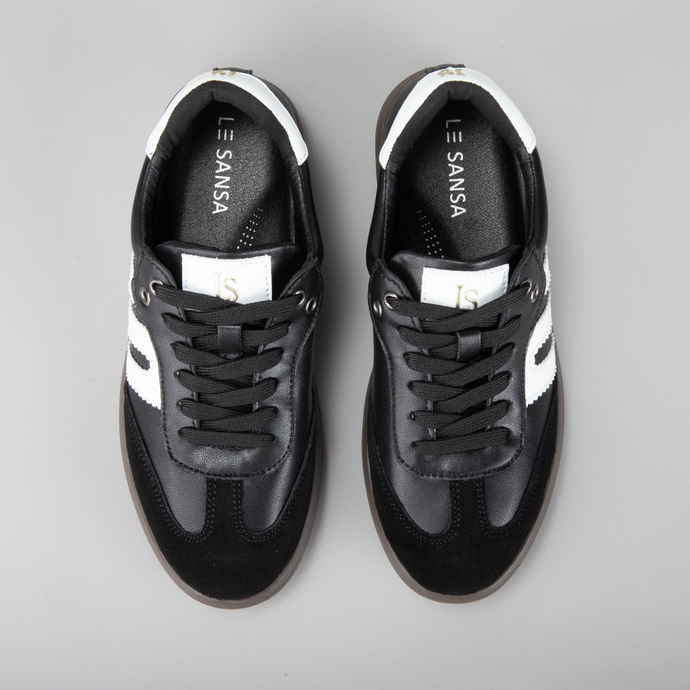 Le Sansa Juno black and white sneakers with stylish design, featuring a sleek look and comfortable fit.