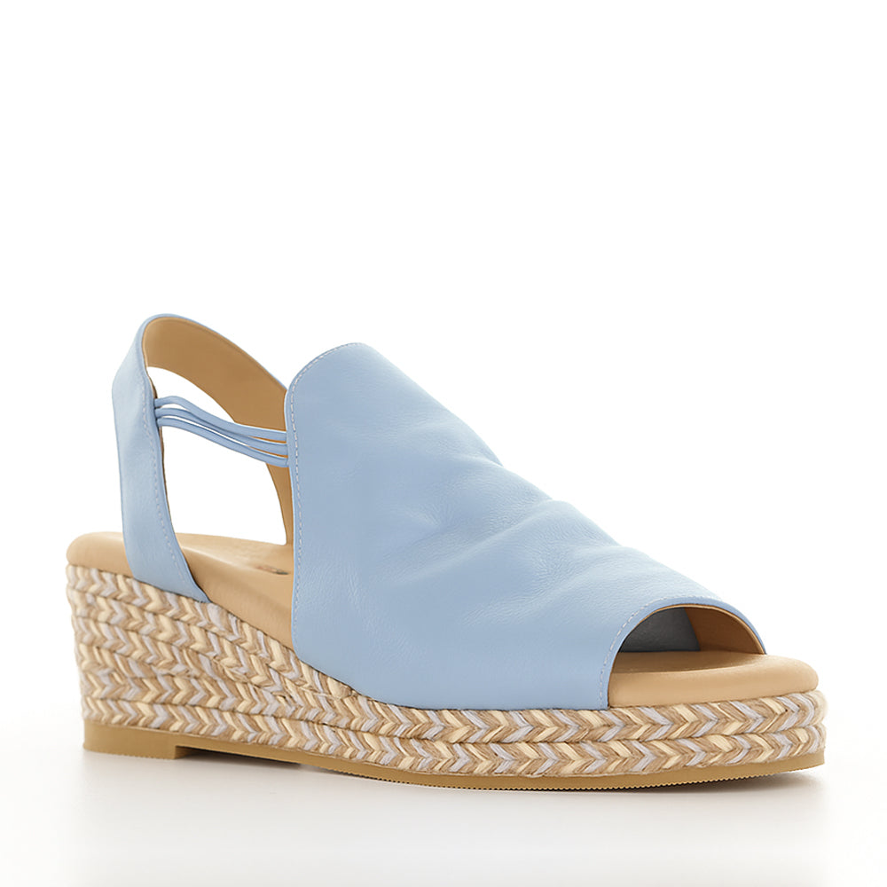 Le Sansa Darla baby blue sandals with open toes and ankle straps, stylish and comfortable footwear for women.
