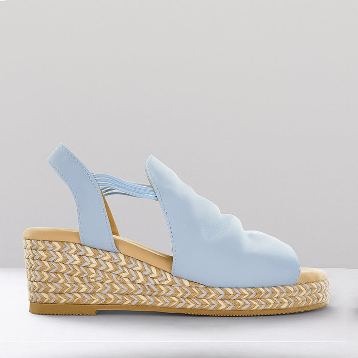 Le Sansa Darla baby blue sandals with open toes and ankle straps, stylish and comfortable for casual wear.