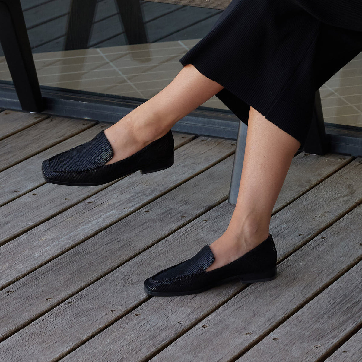 Eos Daylan black embossed loafers with sleek leather finish and stylish design, shown from a front angle.