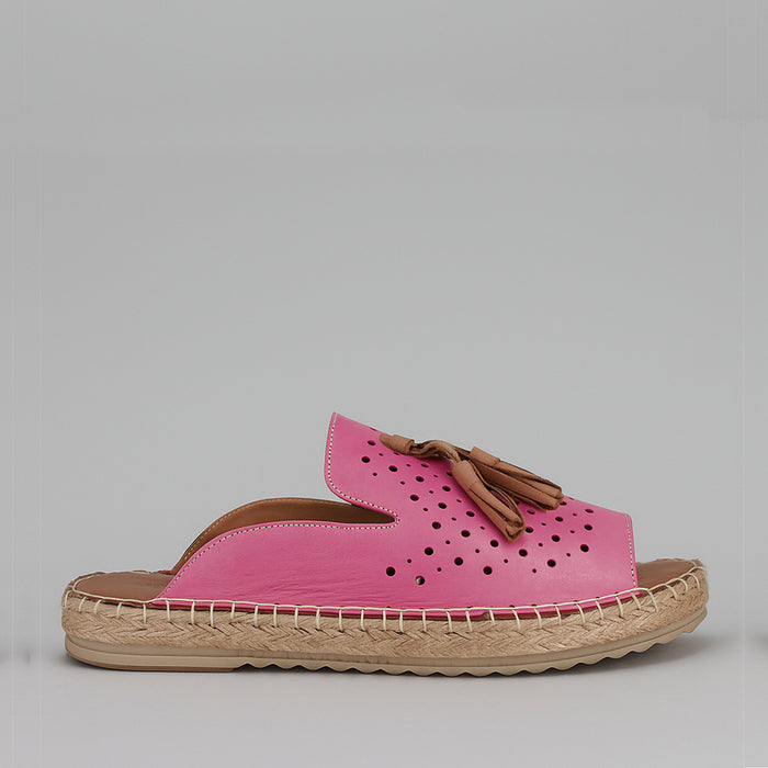 Le Sansa Dolonda fuchsia slip-on shoes with rounded toes and vibrant pink color, showcasing comfortable casual footwear.