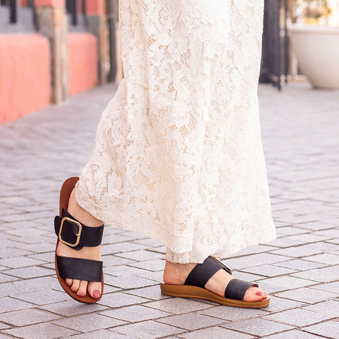 Los Cabos Doti Black flats worn on foot, showcasing stylish black footwear with a sleek design for everyday comfort.