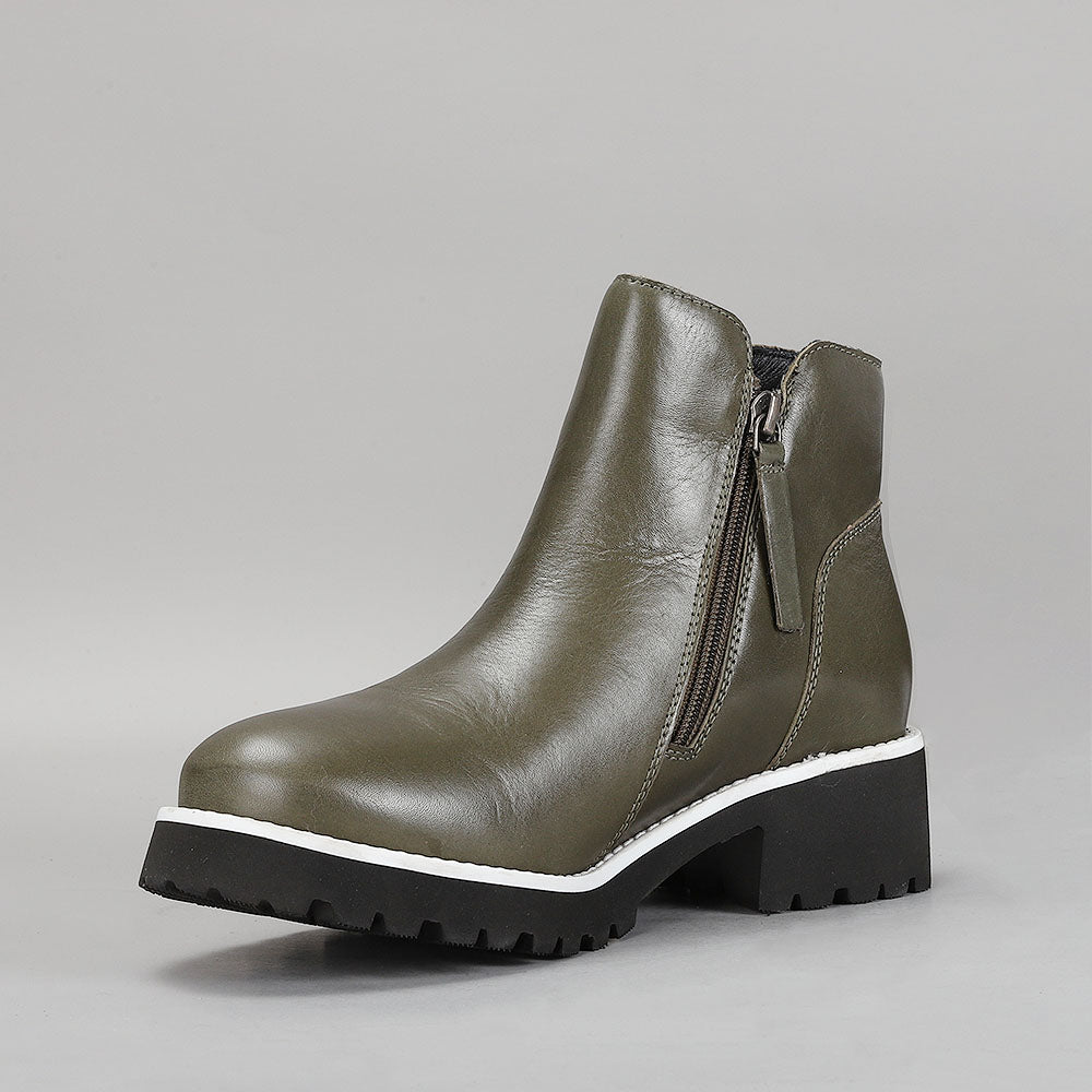 LE SANSA East Olive boots featuring a stylish southwestern design with olive green accents and intricate detailing.