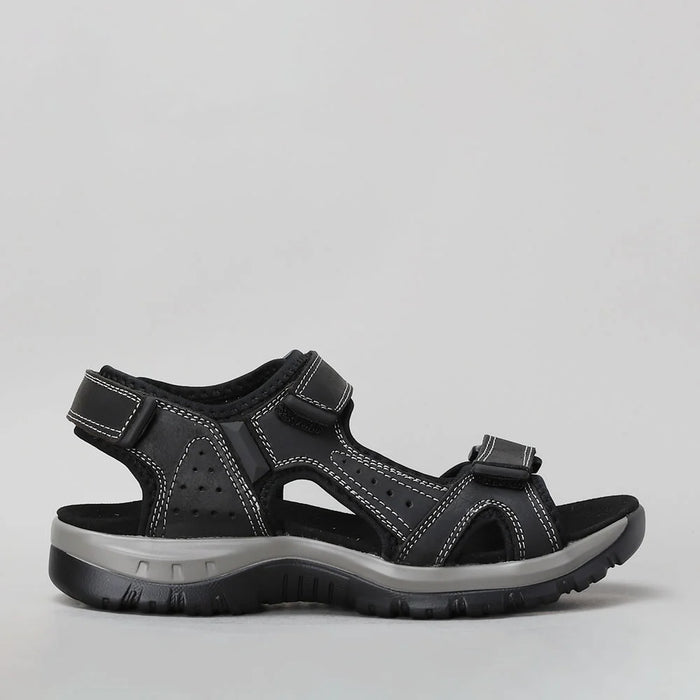 CC RESORTS EKAM Black sandals with side view, featuring sleek design and comfortable straps for casual wear.