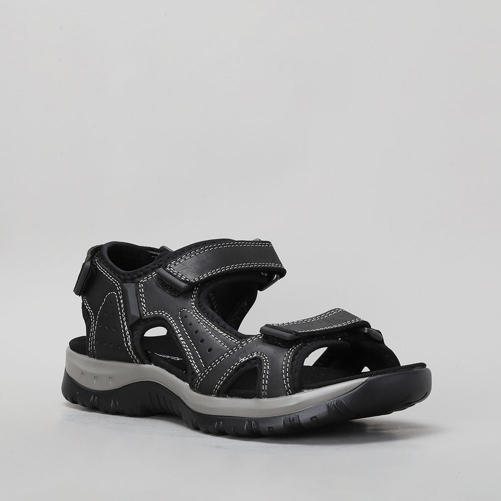 CC Resorts EKAM black sandals featuring a sleek design with adjustable straps and cushioned soles.
