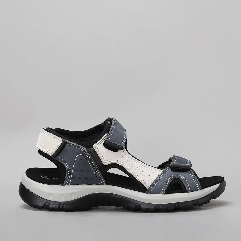 CC Resorts Ekam Navy Bone sandals with multi-strap design, featuring navy and bone-colored straps for casual summer wear.