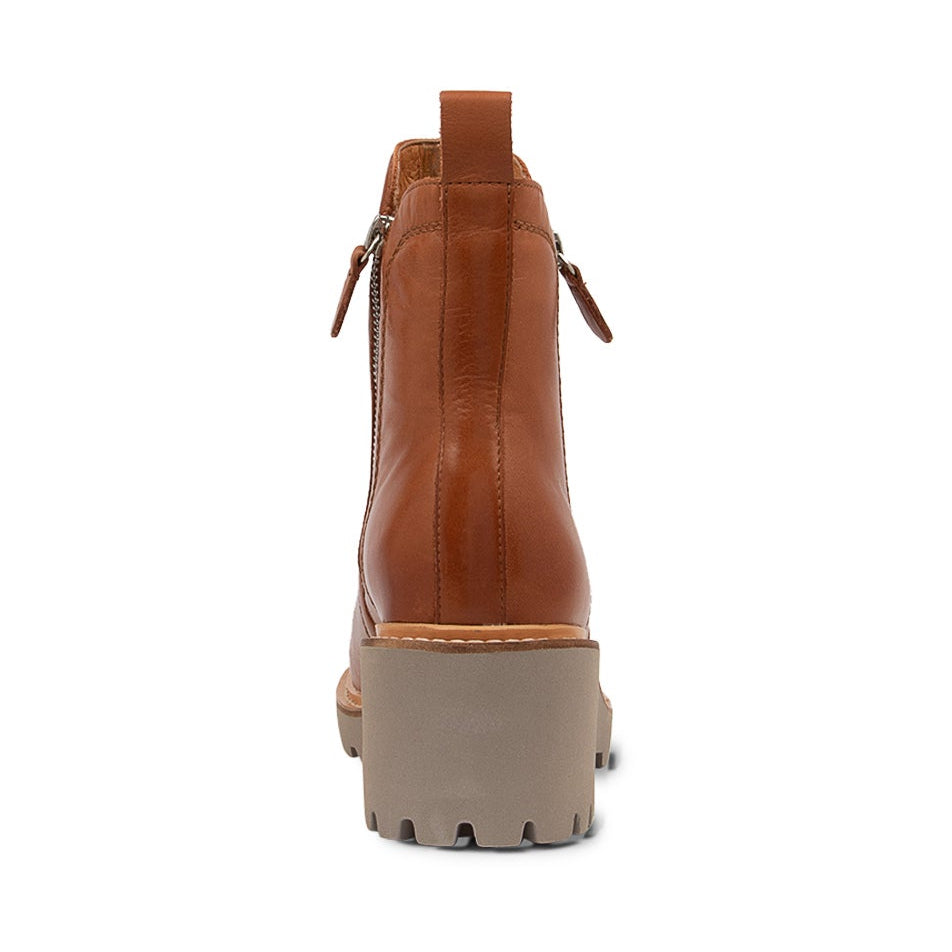 Eos Parsons Brandy boots in tan leather with ankle height and stylish stitching, featuring a rounded toe and low heel.