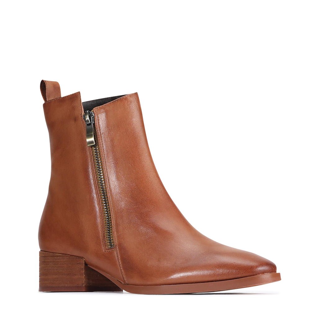 EOS Kendra Brandy boots featuring a sleek design with a rounded toe and ankle-high style, perfect for casual or dressy occasions.