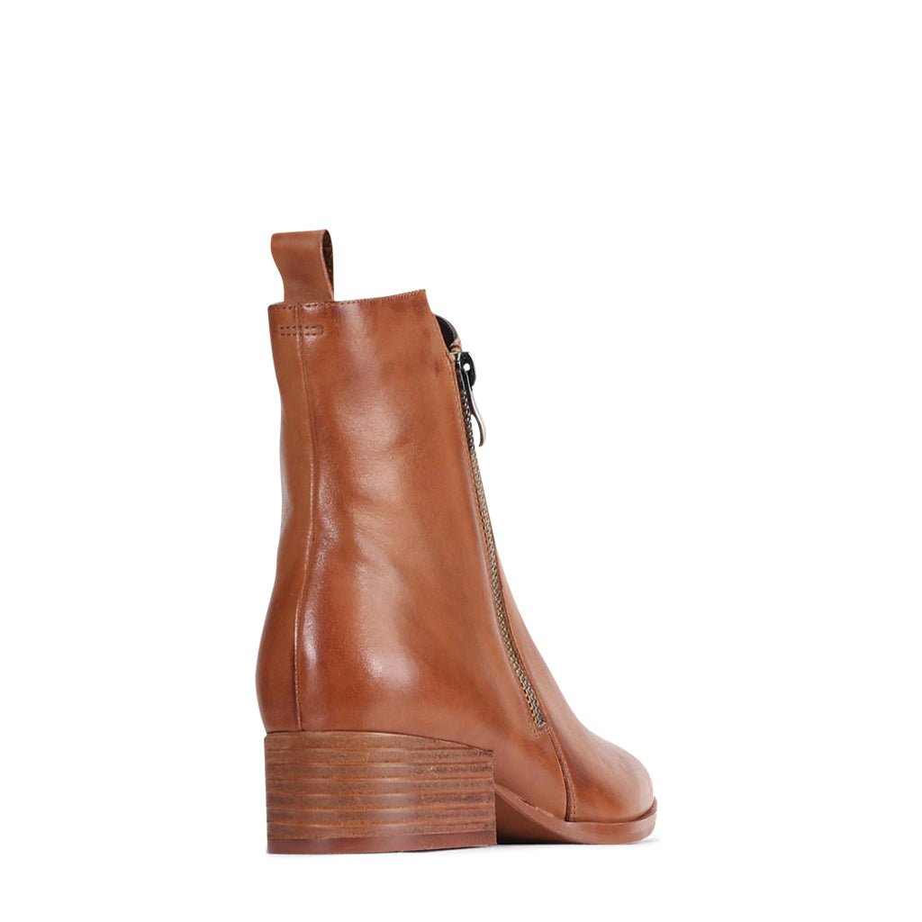 Pair of EOS Kendra Brandy boots featuring a stylish design with suede and leather accents, perfect for casual or dressy wear.