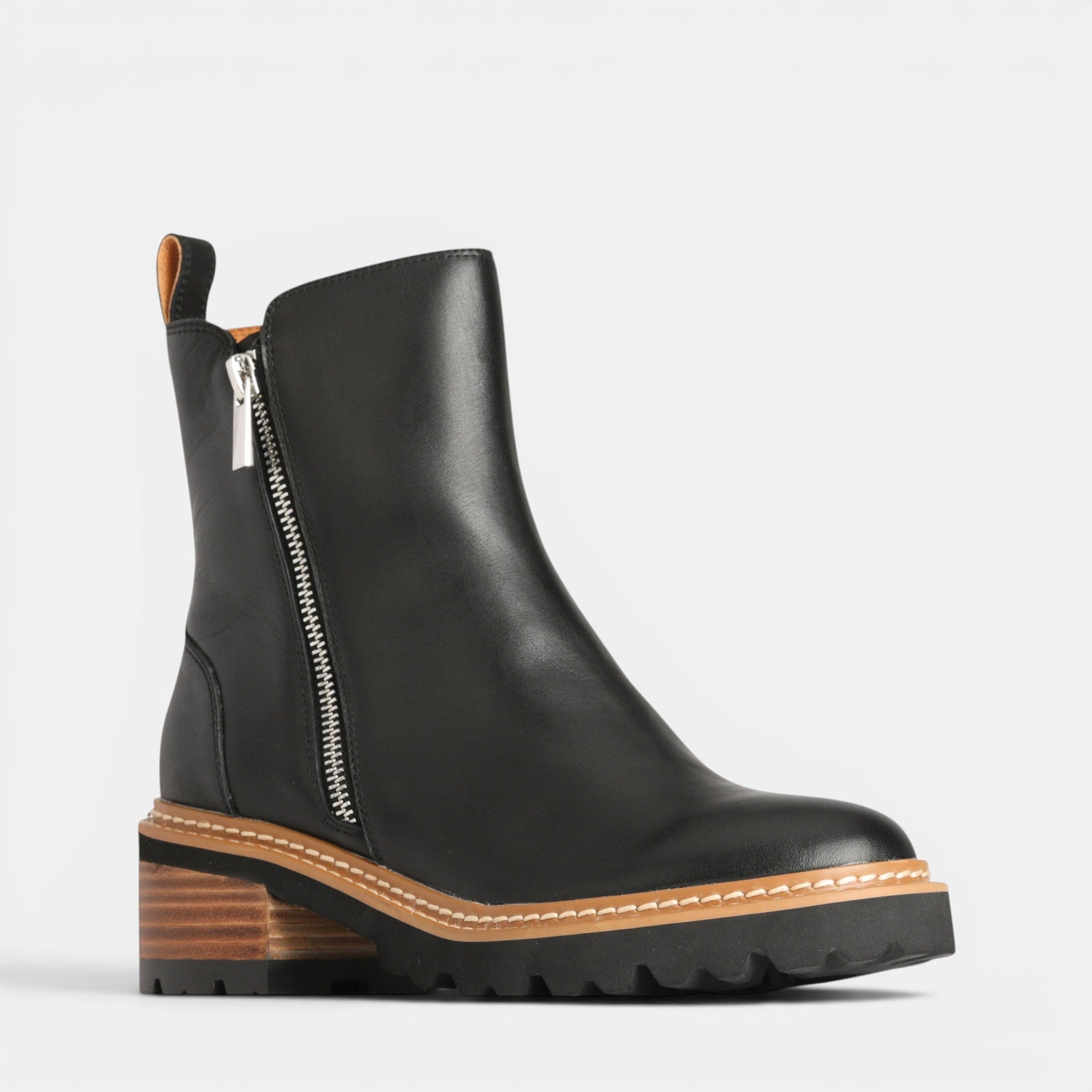 Black EOS Lindira boots showing ankle-high style with sleek leather finish and subtle heel detail.