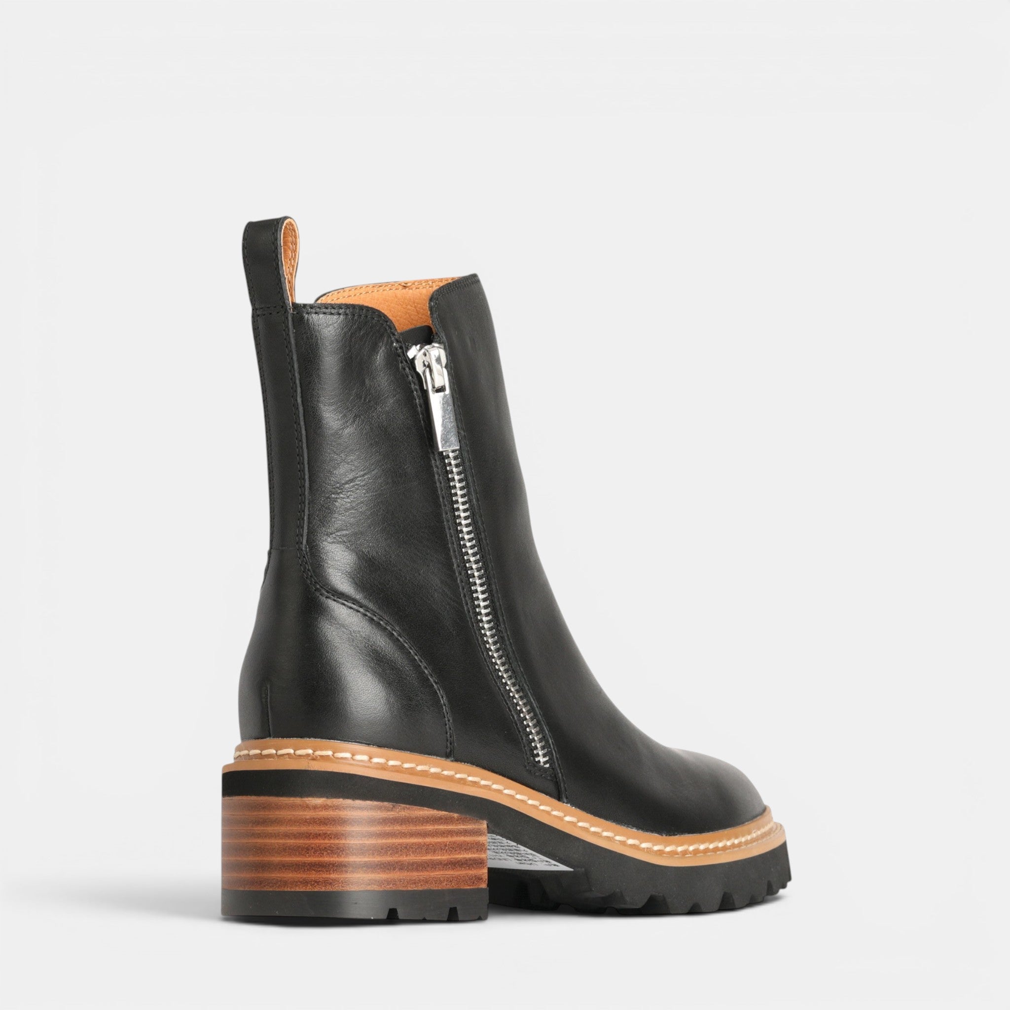 Black EOS Lindira boots with a sleek design, featuring laces and a sturdy sole, perfect for stylish everyday wear.