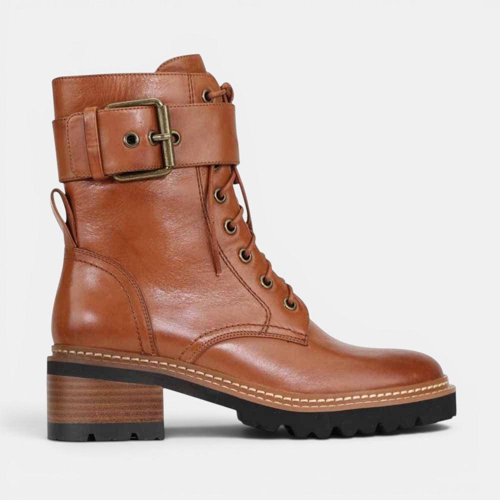 Black EOS Line Brandy boots shown from the side, featuring sleek design and ankle height, made by EOS.