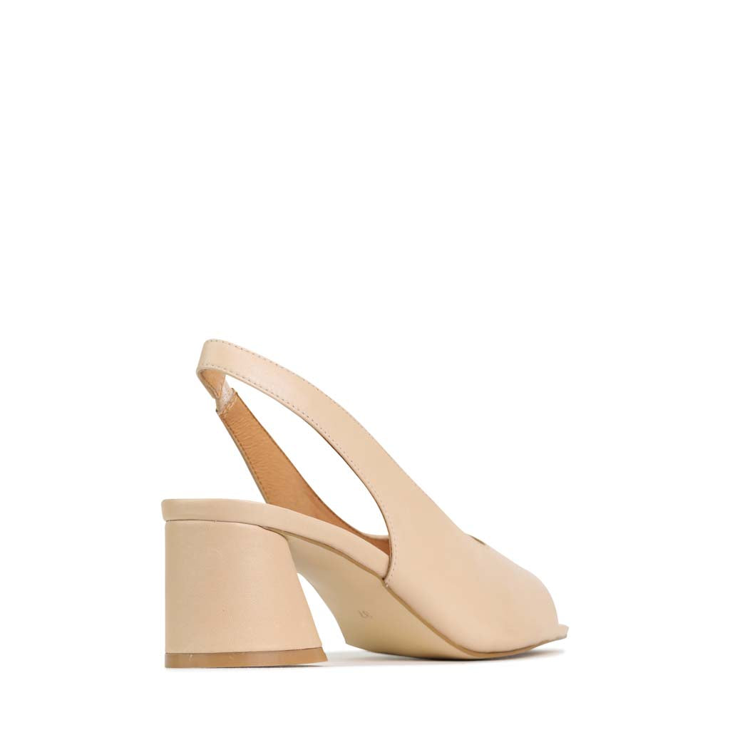 Eos Petel Bone sandals in nude color featuring a stylish, open-toe design with comfortable straps.