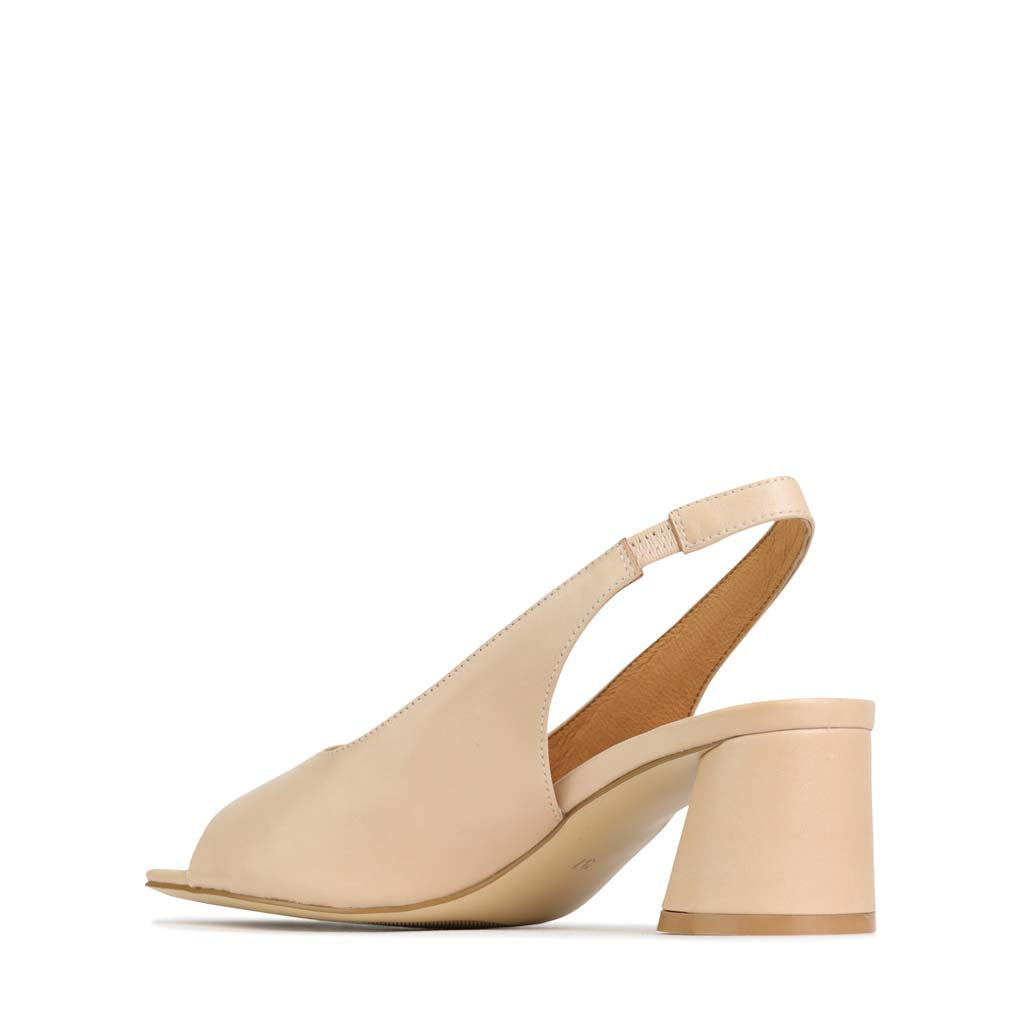 Eos Petel Bone nude sandals featuring a stylish design with open toes and ankle straps, perfect for casual summer wear.