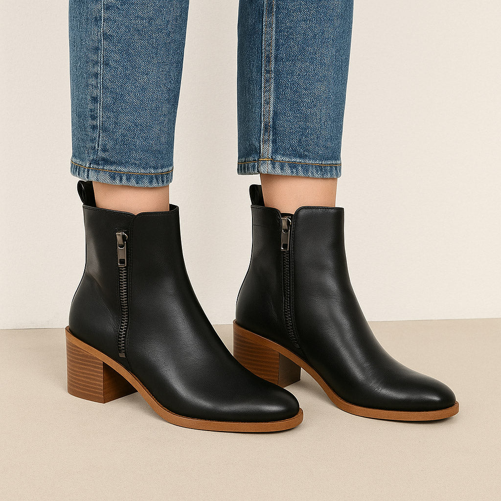 Eos Ciara black boots with sleek design, pointed toe, and ankle-high style, perfect for stylish everyday wear.
