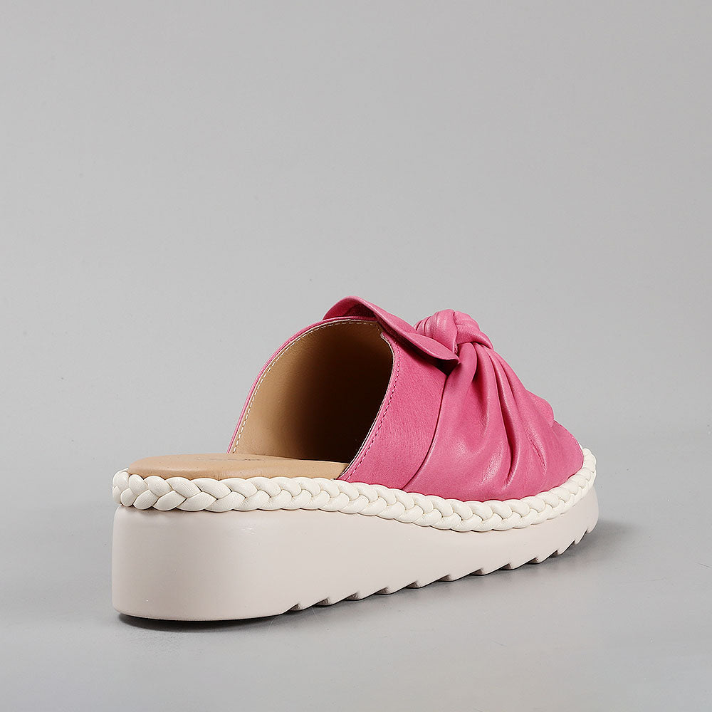 Le Sansa Eudore Hair slip-on shoes in a stylish design, shown in a natural light, highlighting the comfortable fit and sleek appearance.
