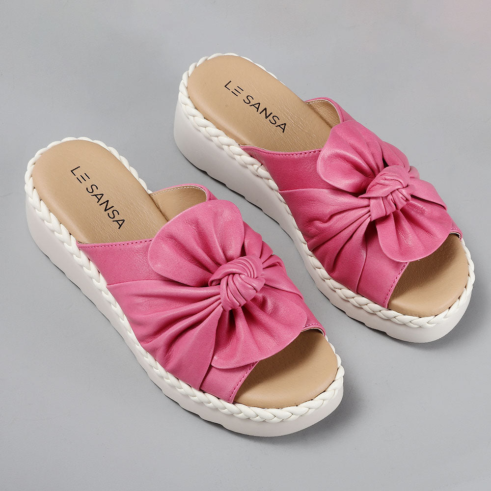 Le Sansa Eudore Hair slip-on shoes shown from an angled view, featuring sleek design and comfortable fit.