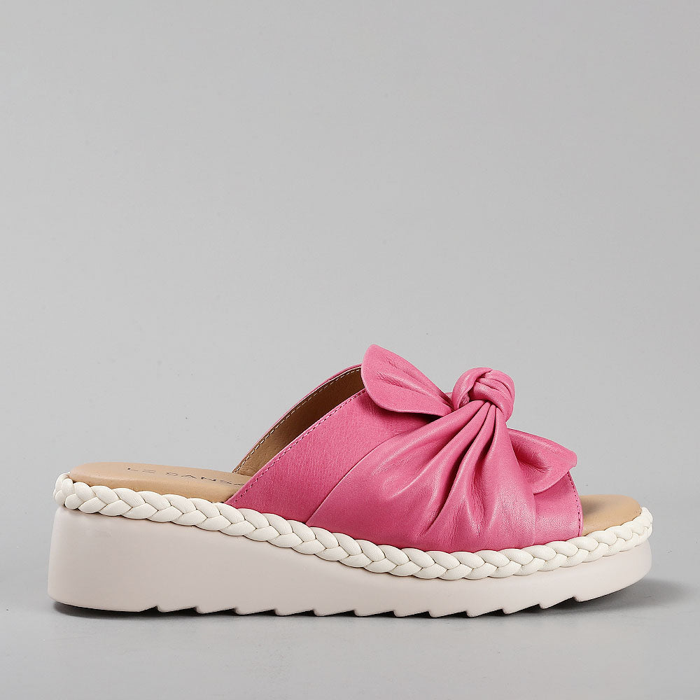 Le Sansa Eudore Hair slip-on shoes with sleek design and neutral color, shown from the side view.