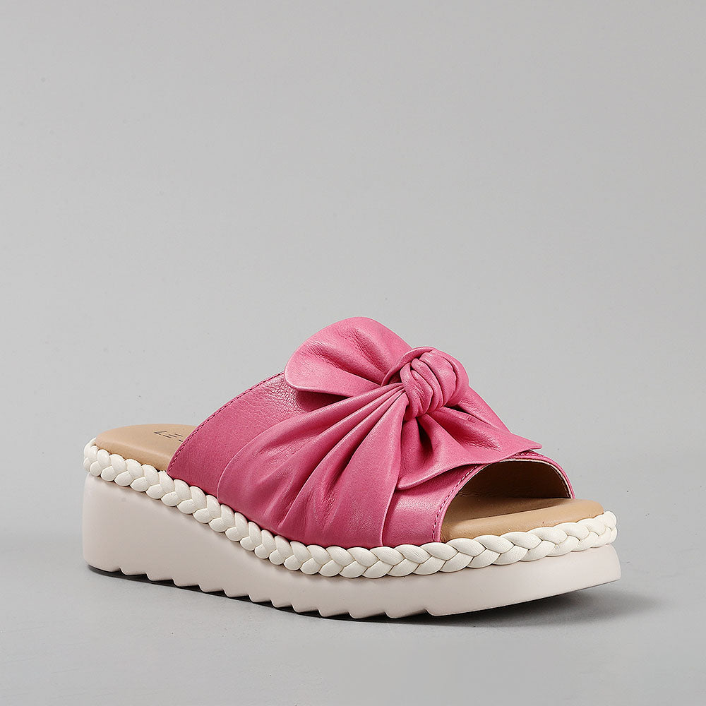 Le Sansa Eudore hair slip-ons featuring a sleek design and comfortable fit, shown from the southeast angle.