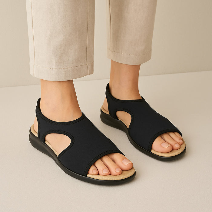 Euroflex Sicily black sandals with open toe and strap design, featuring comfortable flat soles for casual summer wear.