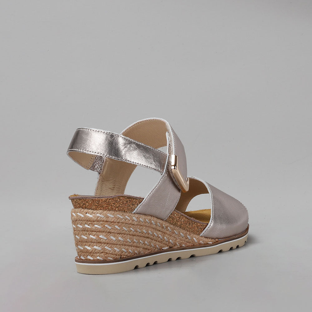 Le Sansa Evita Champagne sandals with strappy design, beige color, and ankle straps, perfect for summer or casual wear.