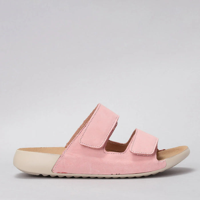 CC Resorts Evola pink flats shown from the side, featuring a sleek design and comfortable slip-on style.
