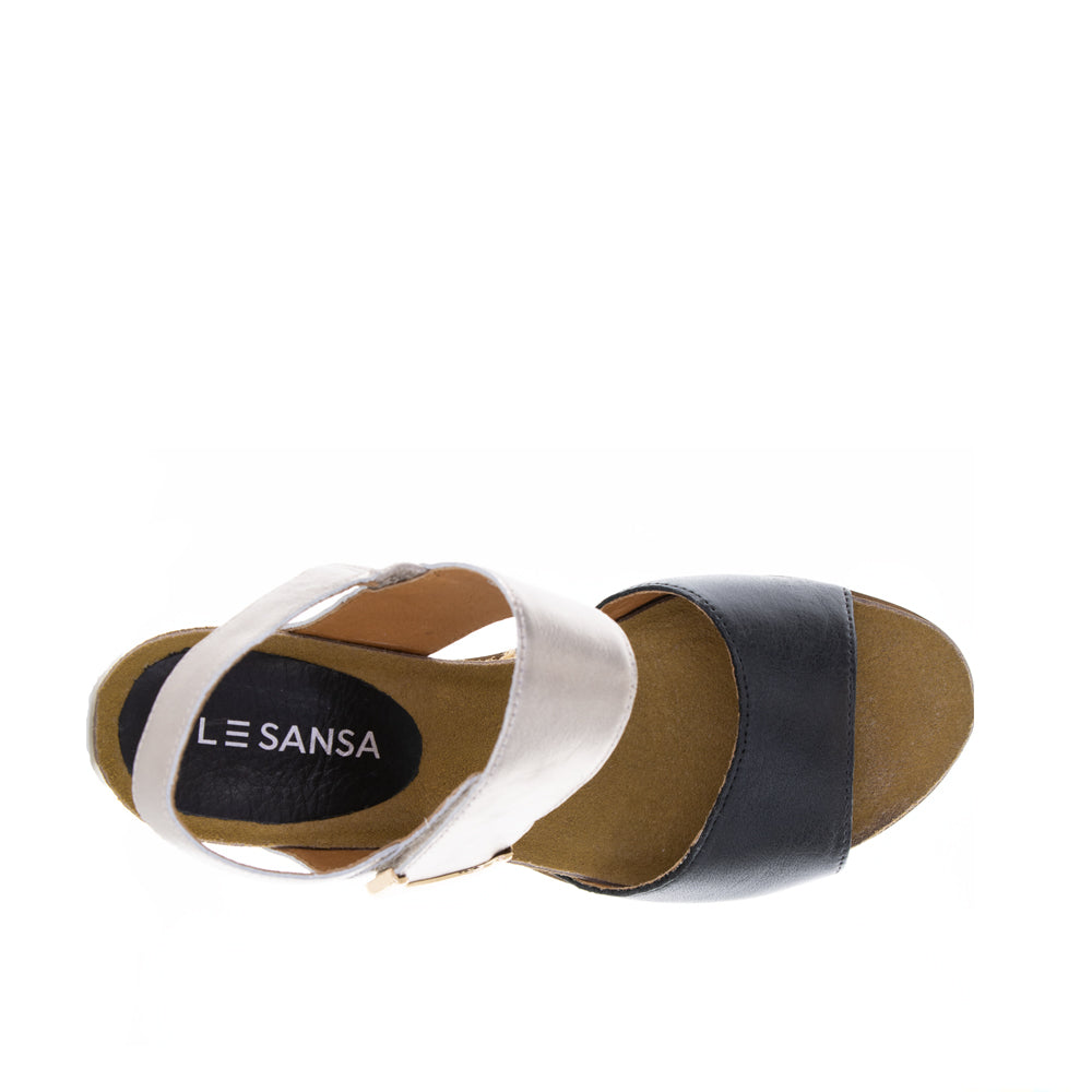 Le Sansa Evita Black Champagne sandals with sleek straps and open toe design, featuring a stylish, elegant look.