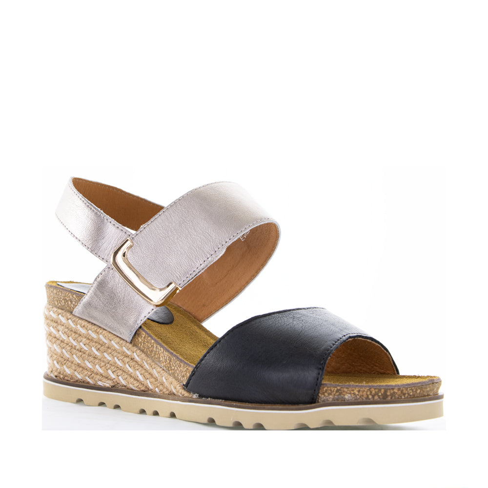 Le Sansa Evita black champagne sandals featuring sleek straps and a low heel, perfect for elegant summer wear.