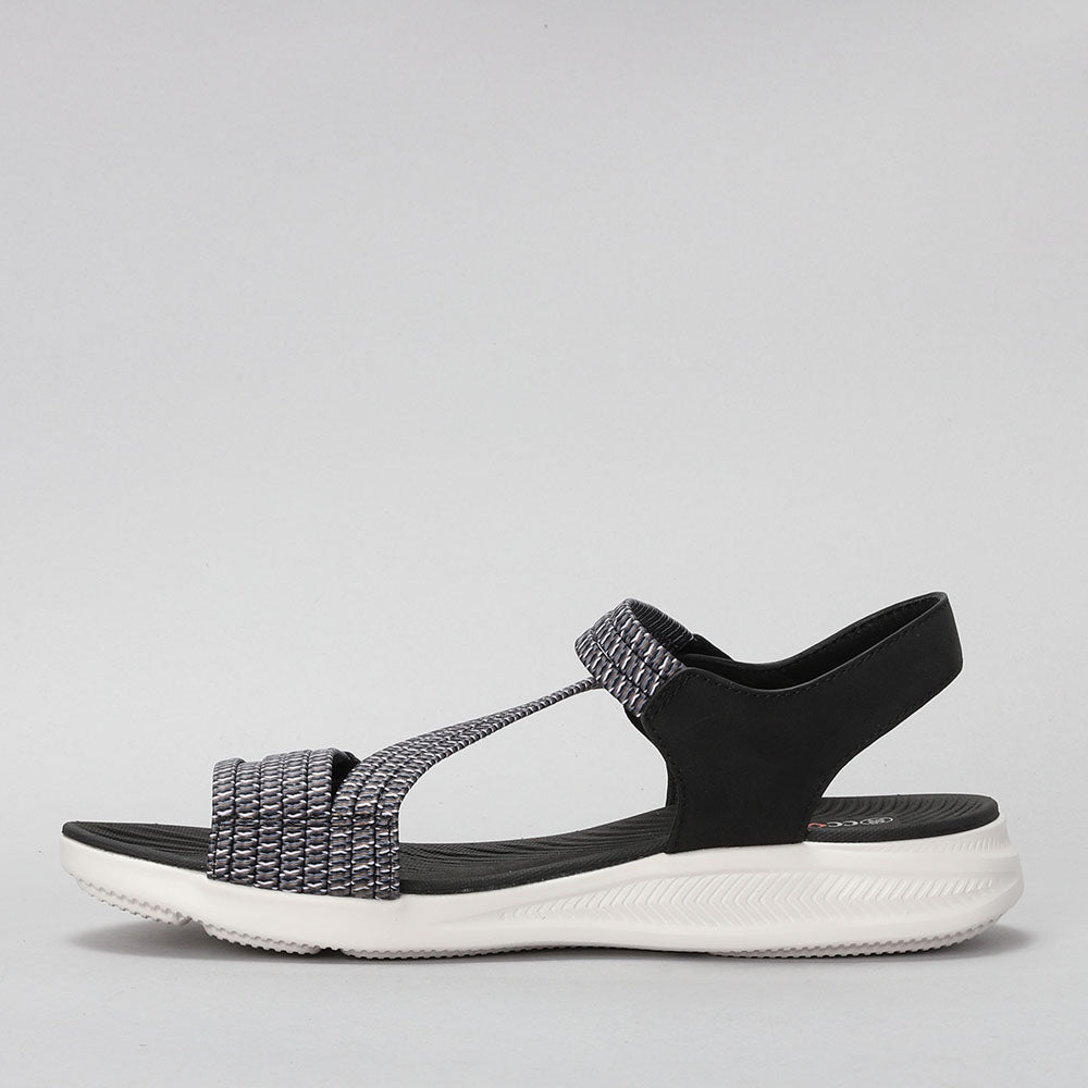 CC RESORTS Florie black multi sandals with strap details, side view showing stylish design and comfortable fit.