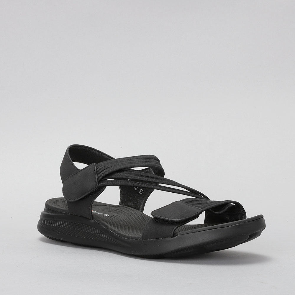 CC RESORTS Florie black sandals featuring a sleek design and comfortable straps, perfect for casual summer wear.
