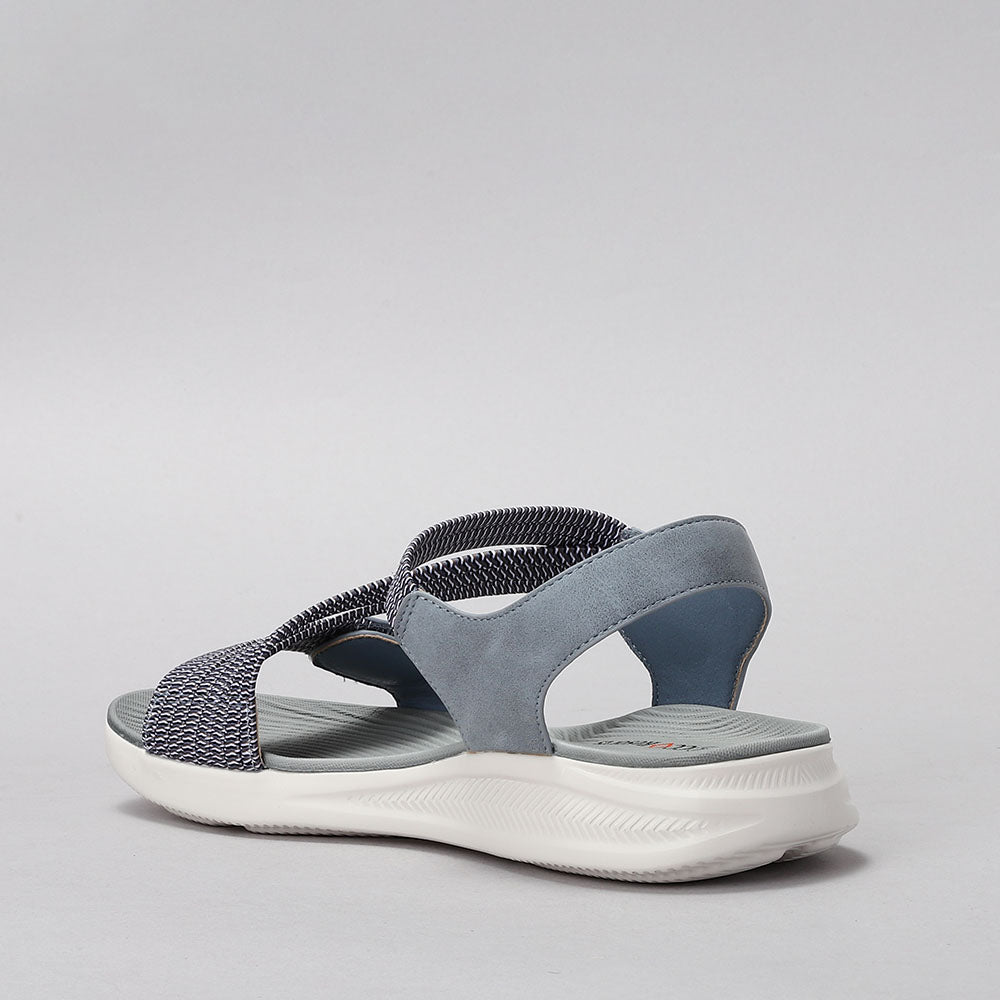CC Resorts Florie denim multi sandals featuring colorful floral patterns and casual slip-on design.