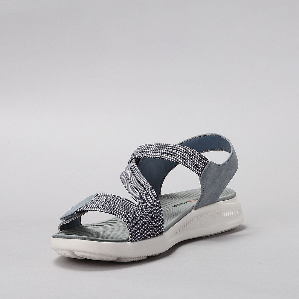 CC Resorts Florie denim multi sandals with Southwest-inspired pattern, featuring a casual slip-on design and colorful woven details.