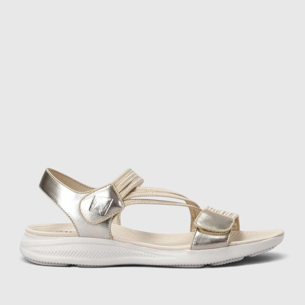 CC Resorts Florrie LT Gold sandals with strappy design and metallic finish, displayed on a neutral background.